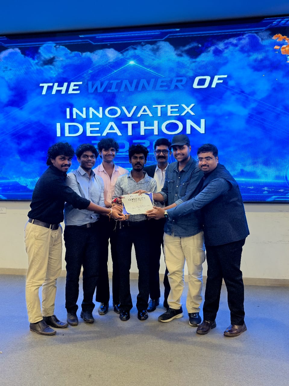 Team GreyMatterX receiving the INNOVATEX Ideathon 2026 winner's certificate