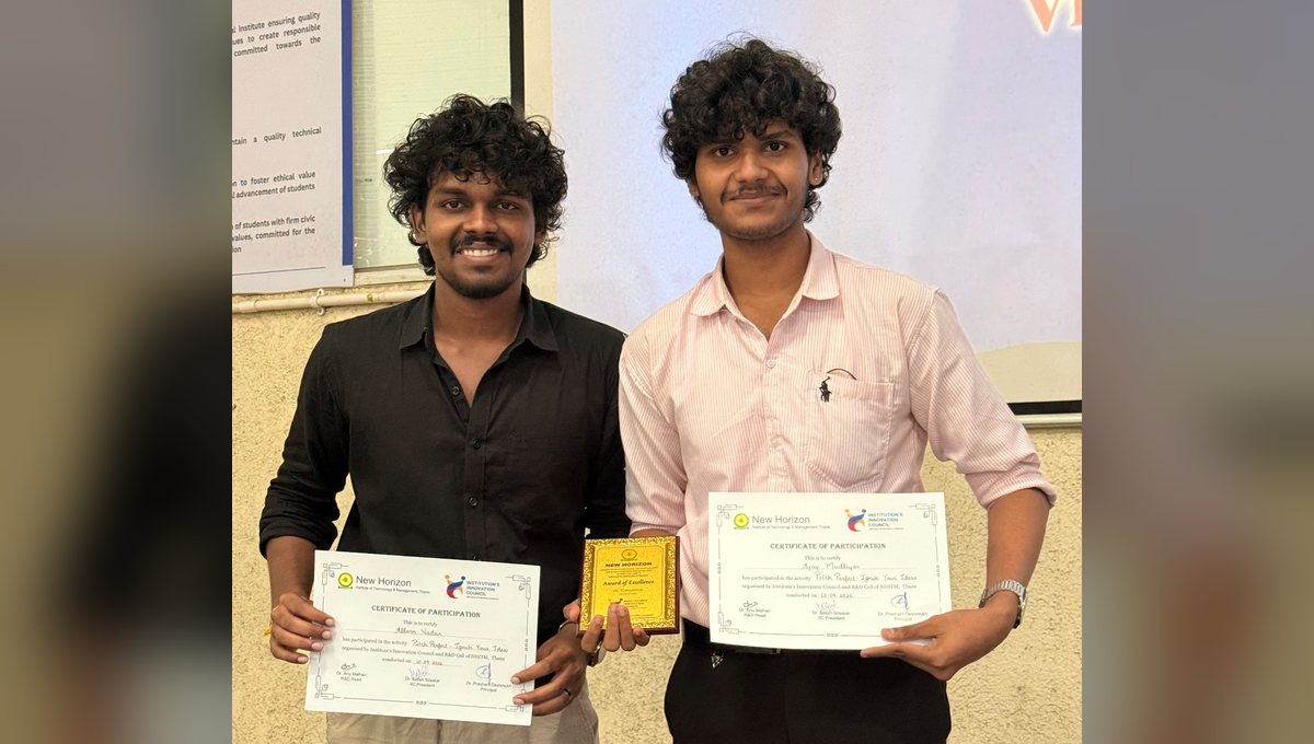 Two Team GreyMatterX members holding their Pitch Perfect 2026 certificates and an award plaque